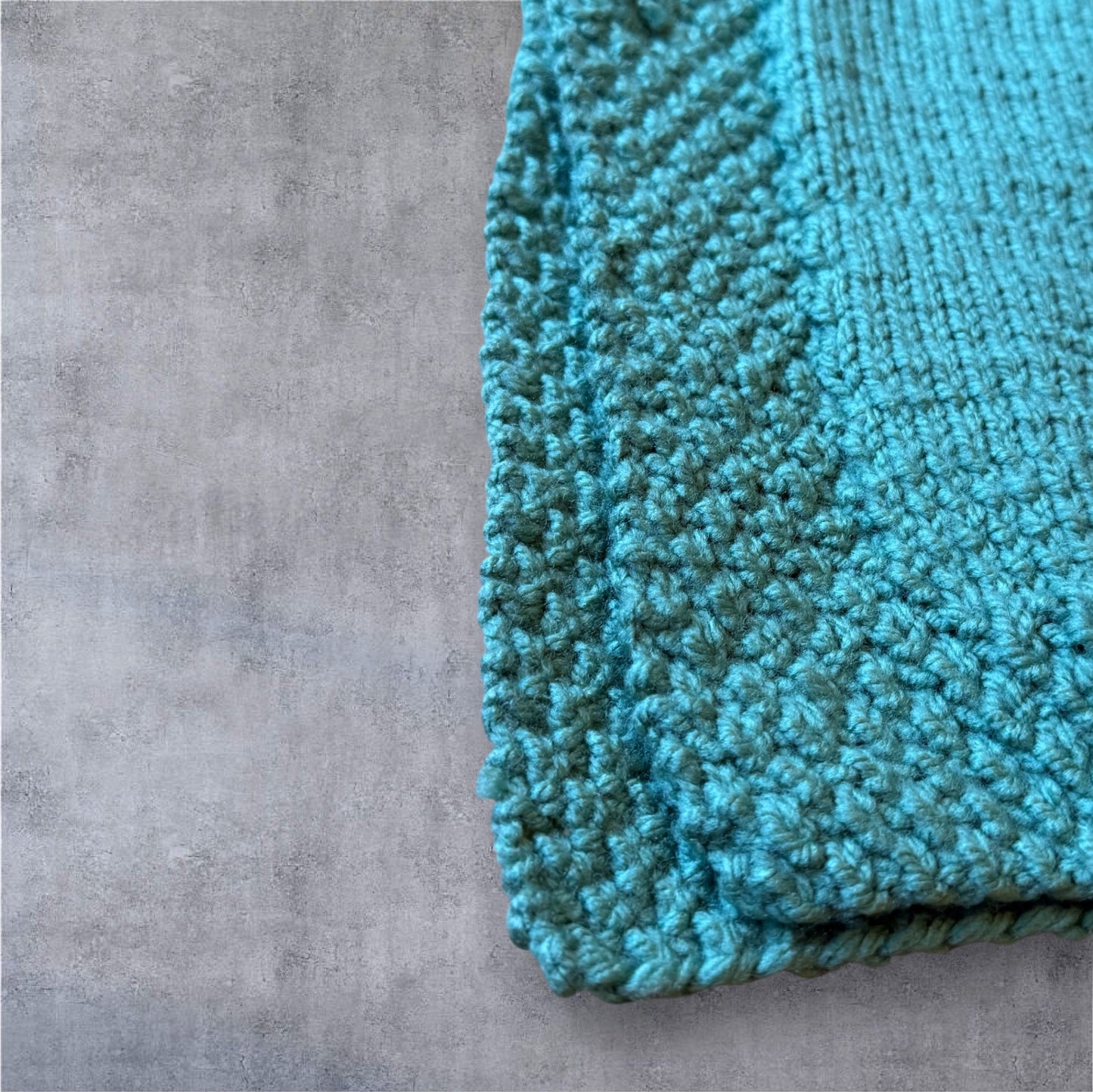 Luxury Hand-Knit Children’s Poncho (Aqua)
Made in Donegal