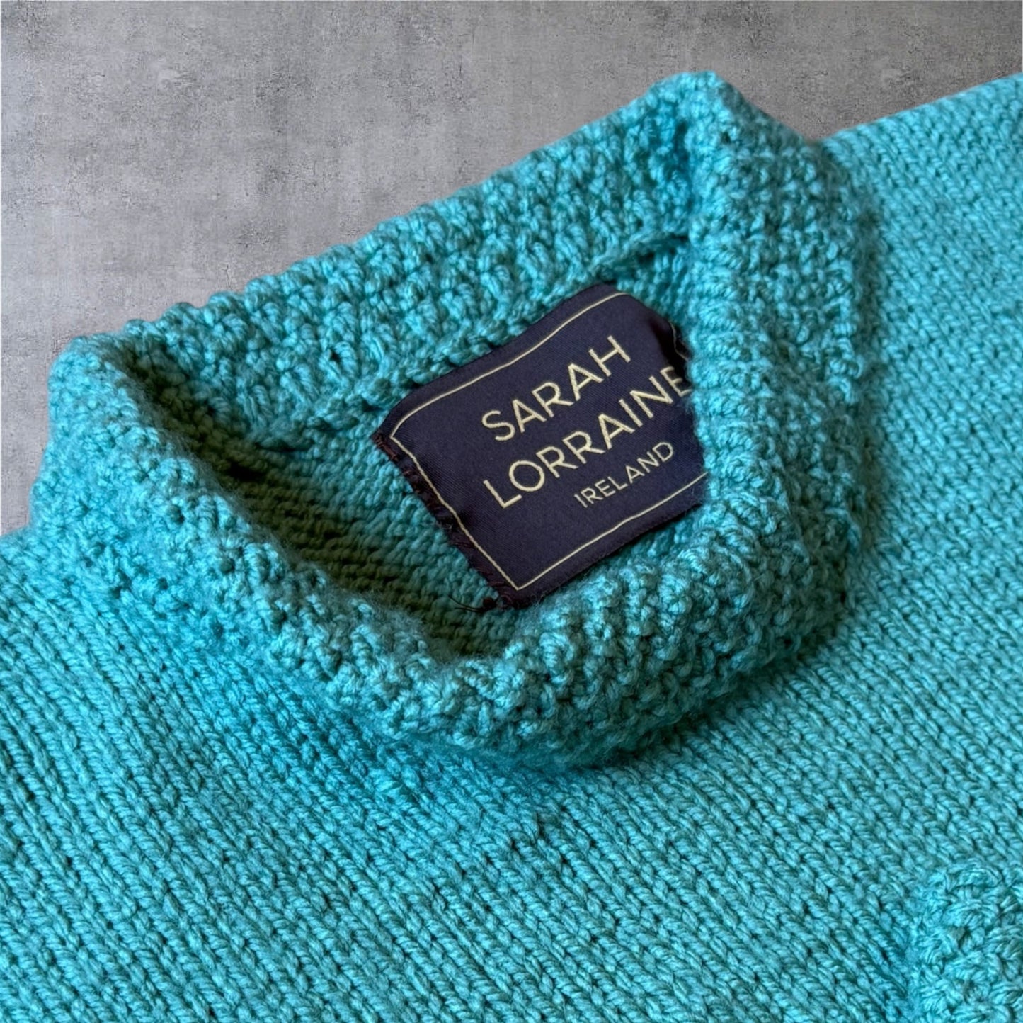Luxury Hand-Knit Children’s Poncho (Aqua)
Made in Donegal