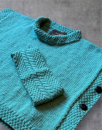 Luxury Hand-Knit Children’s Poncho (Aqua)
Made in Donegal